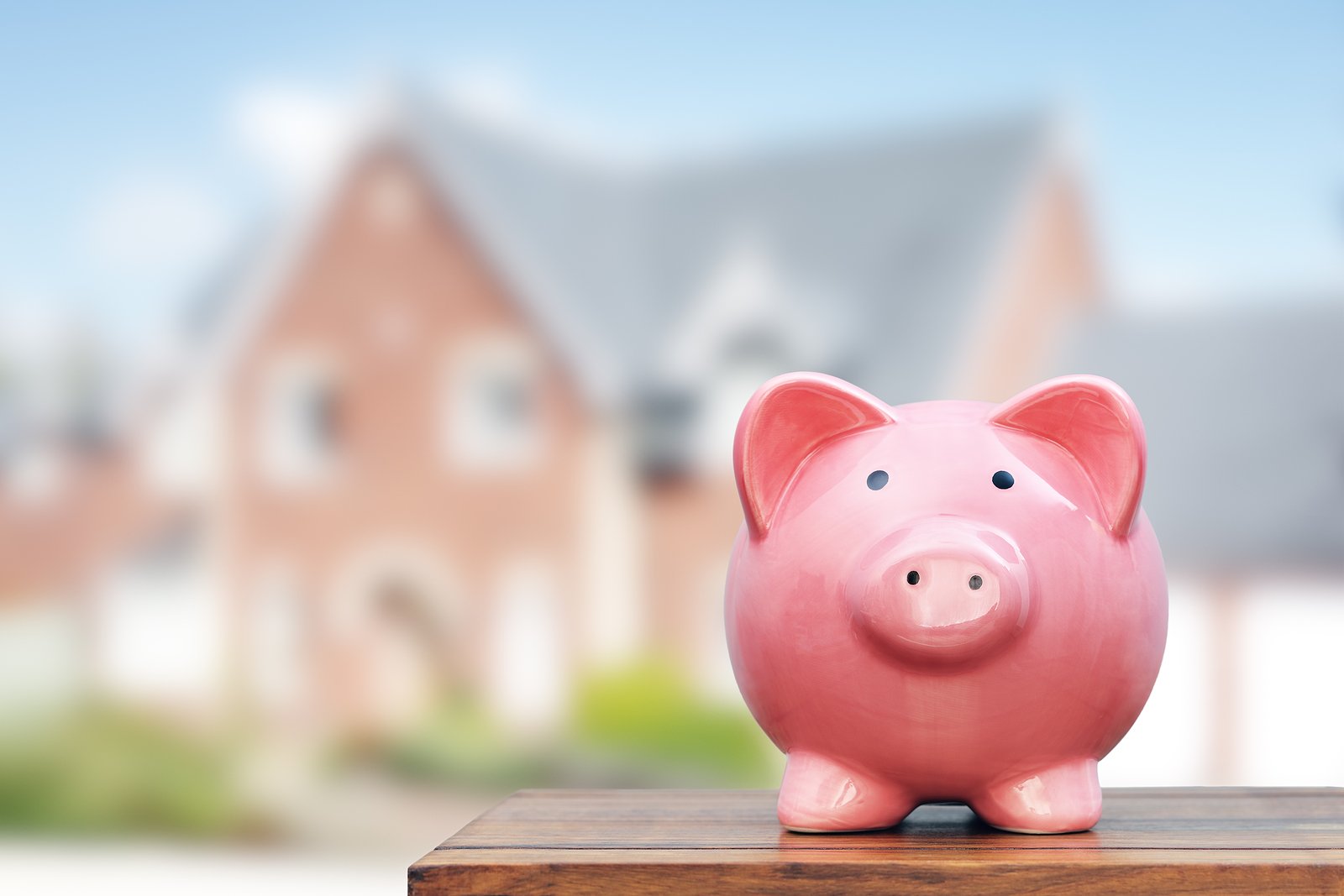 Saving to buy a house, real estate or home savings, piggy bank i