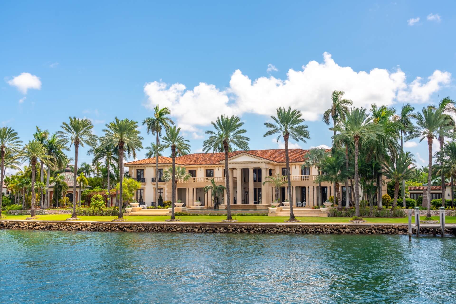 Luxurious mansion with palm trees in Miami Beach, florida