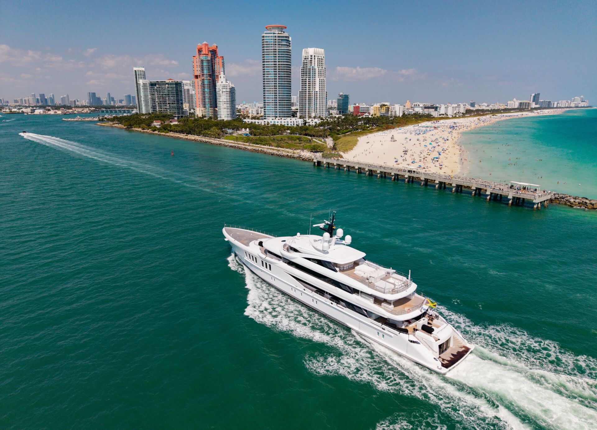 Yacht cruising near Miami skyline