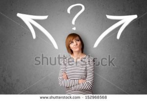 stock-photo-pretty-young-woman-making-a-decision-with-arrows-and-question-mark-above-her-head-152968568