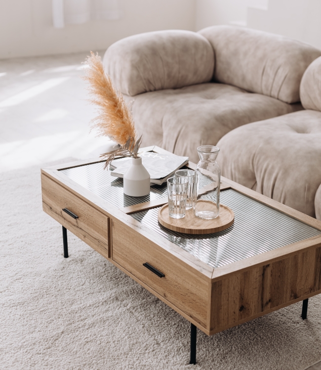 Interior design of harmonized living room with design beige sofa