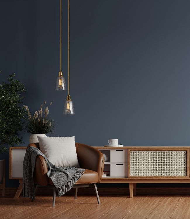 Blue living room with leather armchair(1)