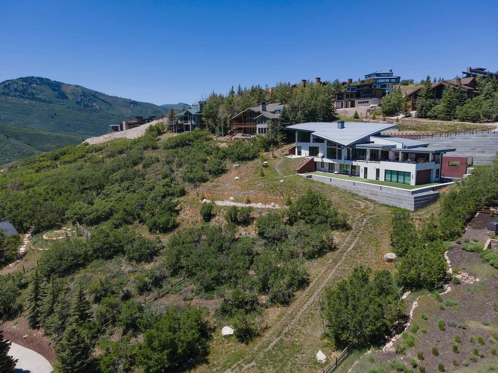 A mountain home on a wooded hillside