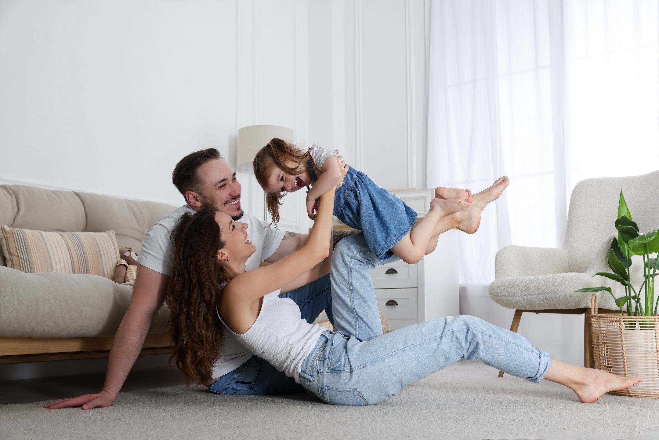 Happy,Family.,Parents,And,Their,Cute,Little,Daughter,Having,Fun