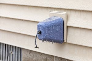 Outdoor,Faucet,,Water,Spigot,,With,Ice,On,Insulation,Cover.,Home