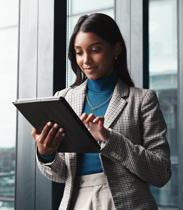 Typing,,Tablet,And,Planning,With,Business,Woman,In,Office,For