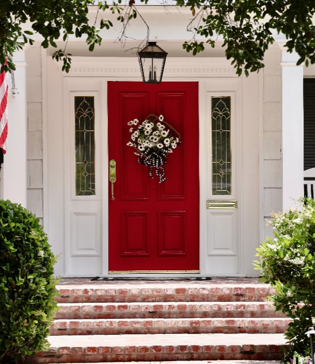Elegant white house with bright red front door(1)