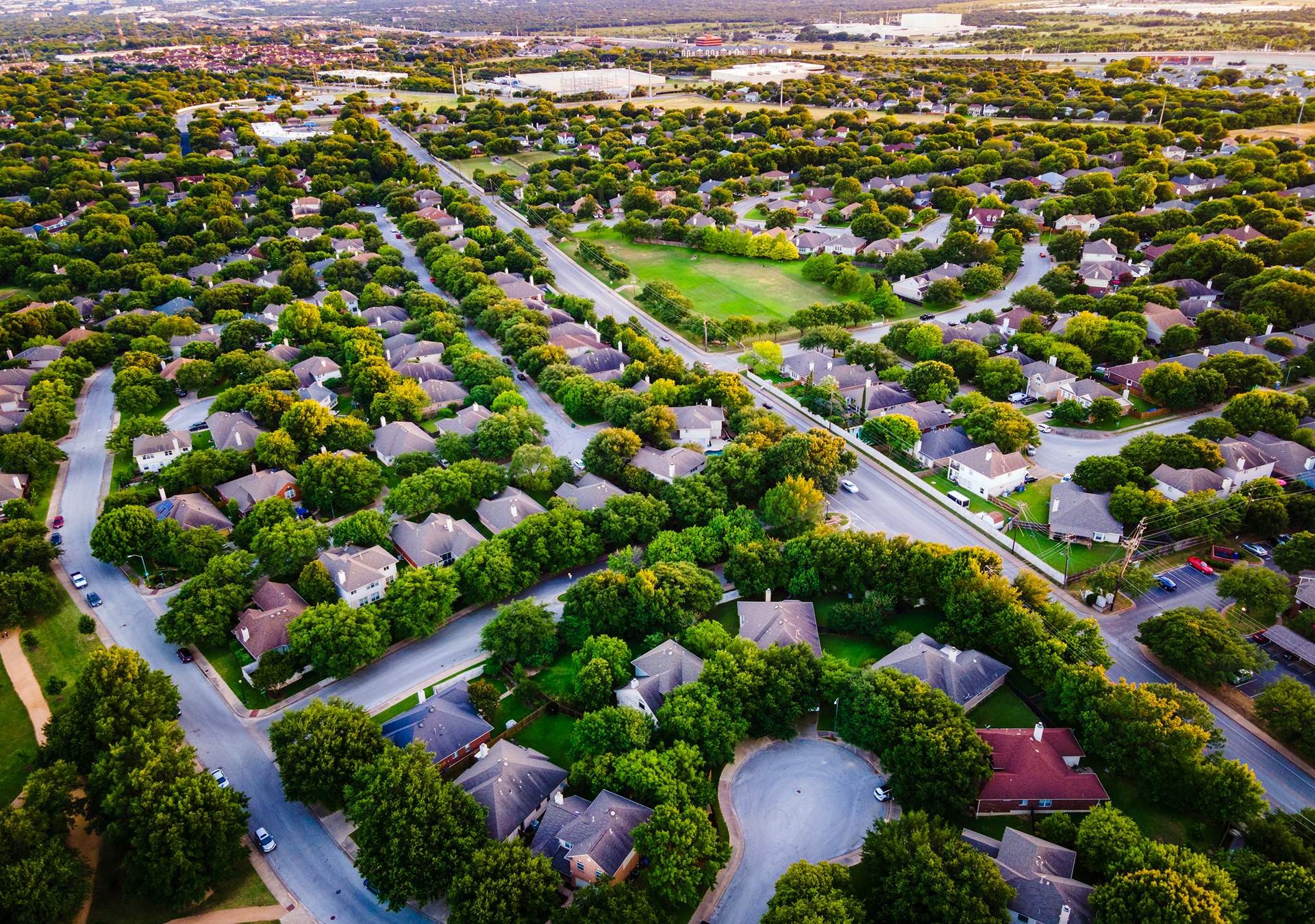 aerial drone views above huge real estate neighborhood in Round Rock , Texas a growing hub of Austin , Texas , USA