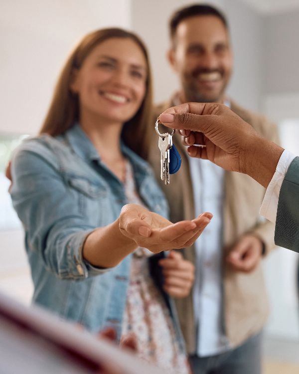 106. happy couple receiving keys of their new home(1)