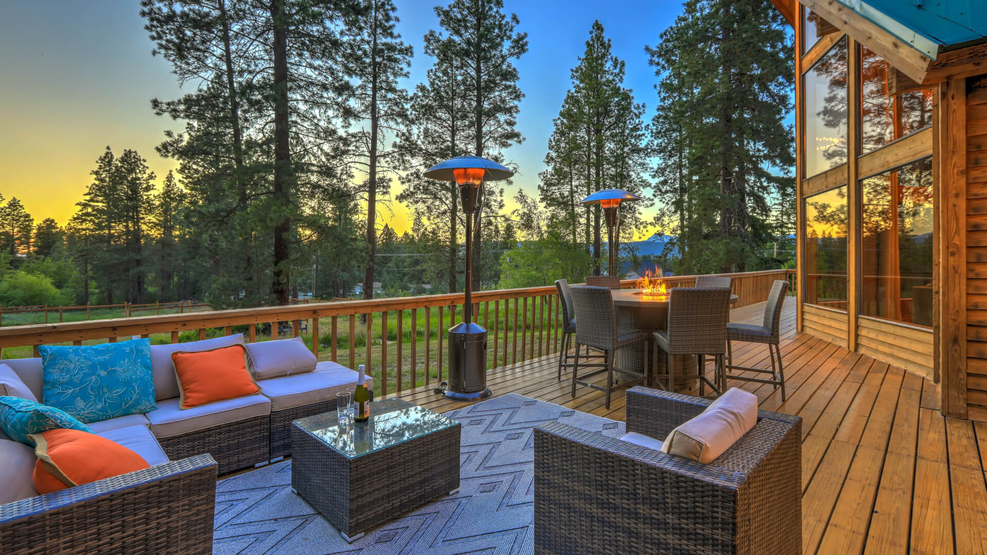 Beautiful chalet cider home exterior during evening with new deisgn outdoor furniture.