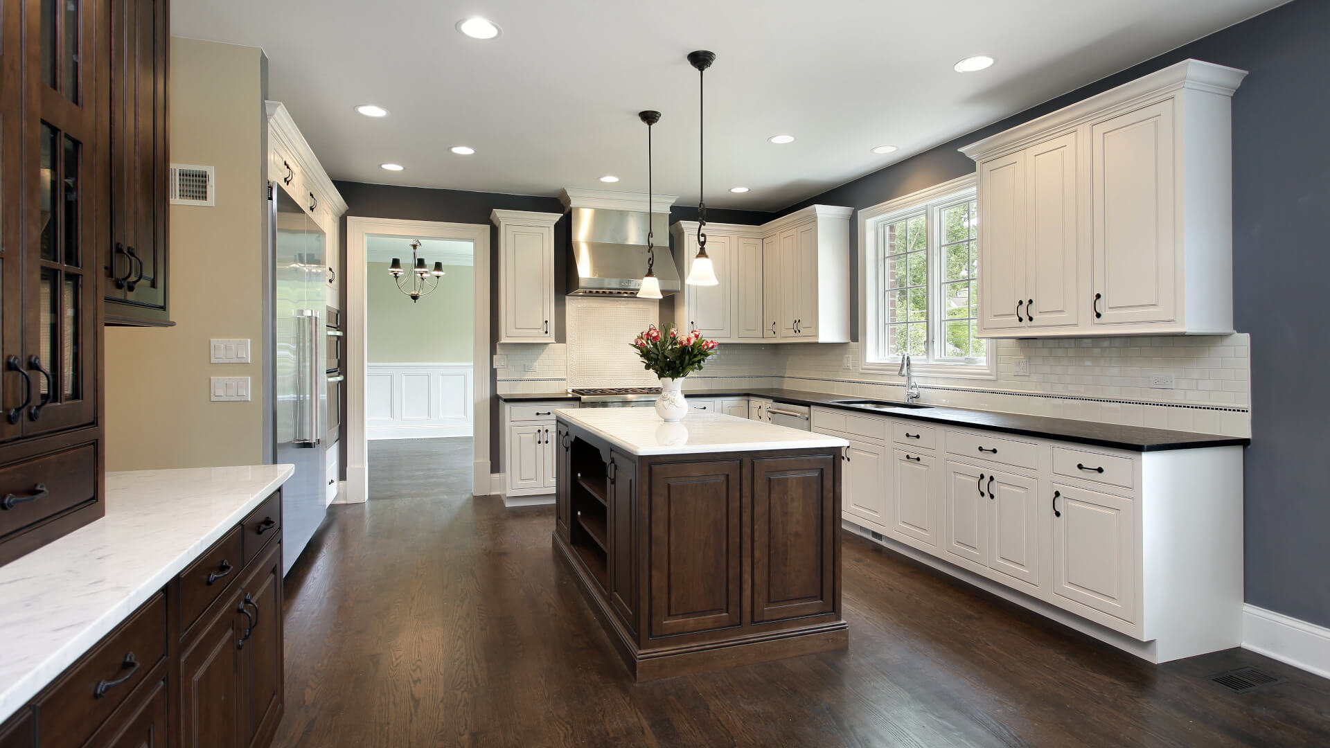 Kitchen in remodeled home with center island.