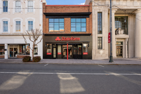 Quiet town street with storefronts