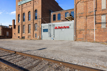 Urban parking lot with brick buildings