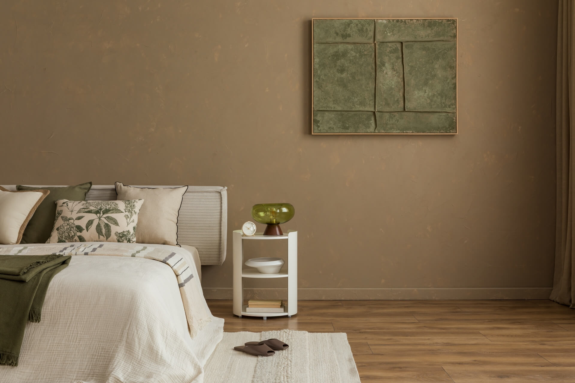 Wide view of earth-toned bedroom