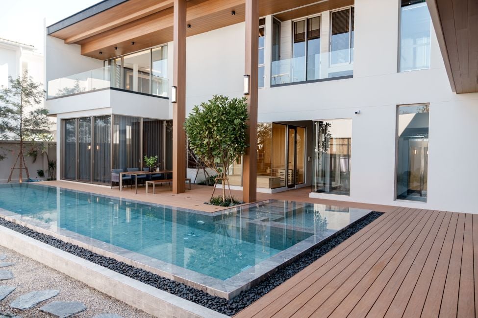 New home beautiful backyard with custom pool with fire pit vertical