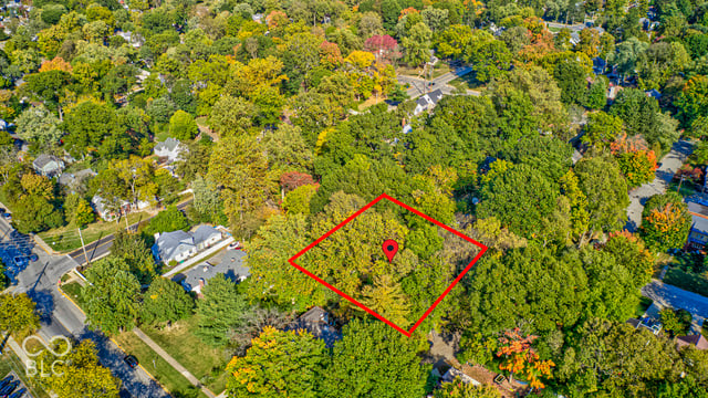 Aerial view of the 0.28 acre wooded ravine lot at 252 W Beverly Dr in Butler-Tarkington