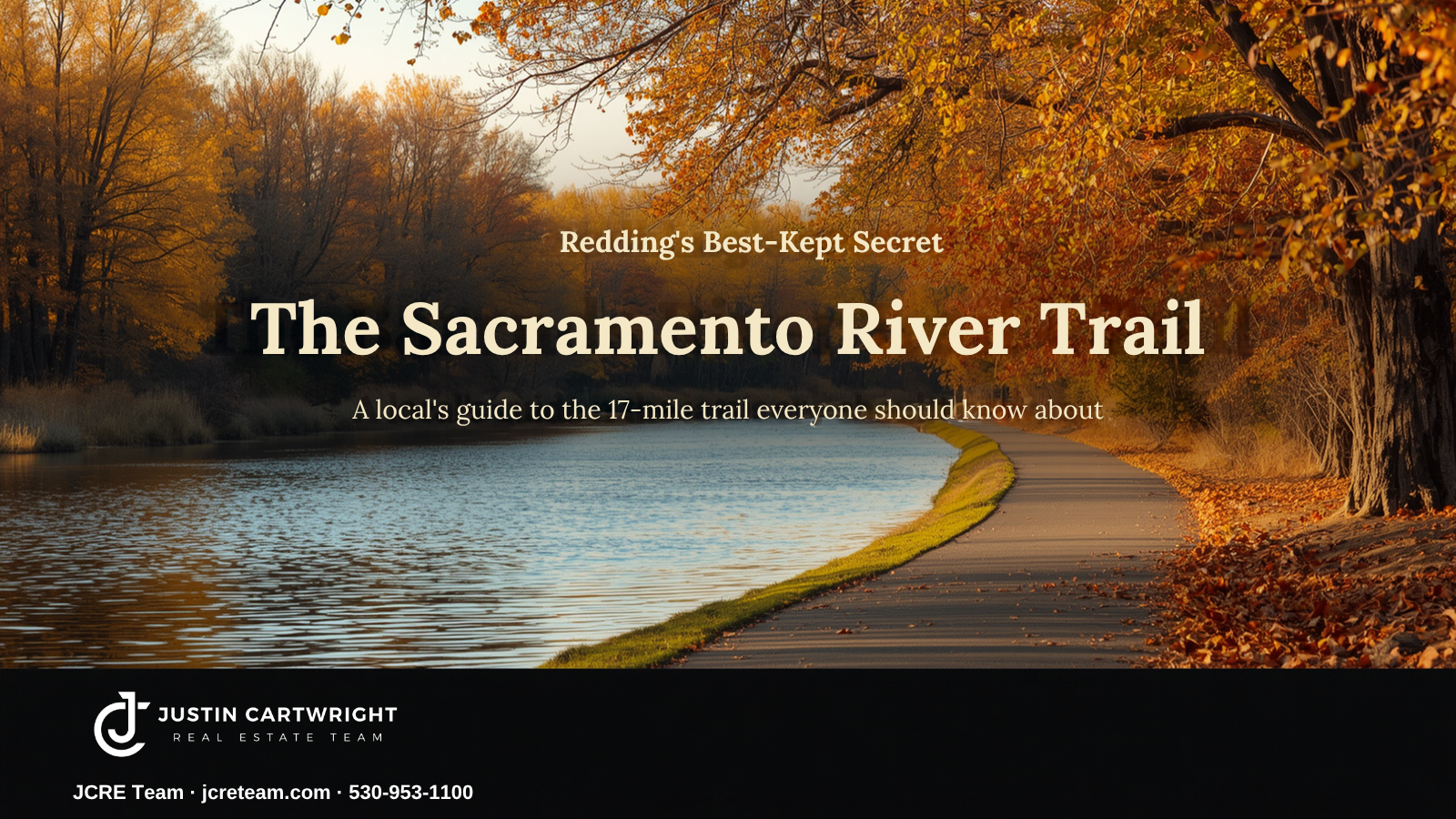 The Sacramento River Trail in Redding, California in fall, with a paved path along the river lined with autumn foliage