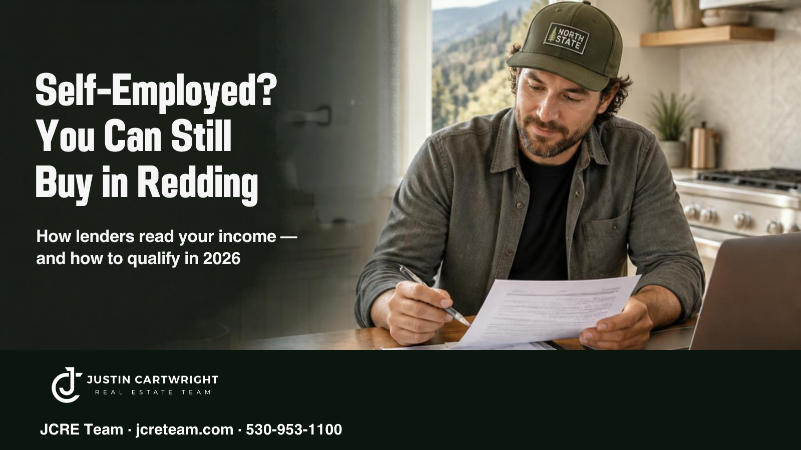 Self-employed Redding home buyer reviewing mortgage paperwork at a kitchen table