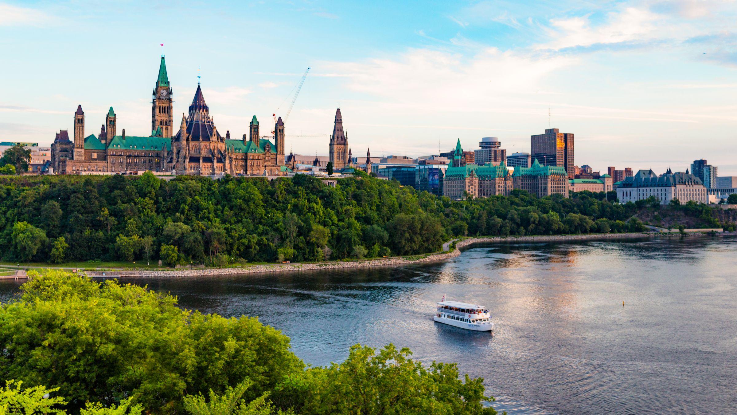 Parliament Hill and a Tour Boat on the Ottawa River