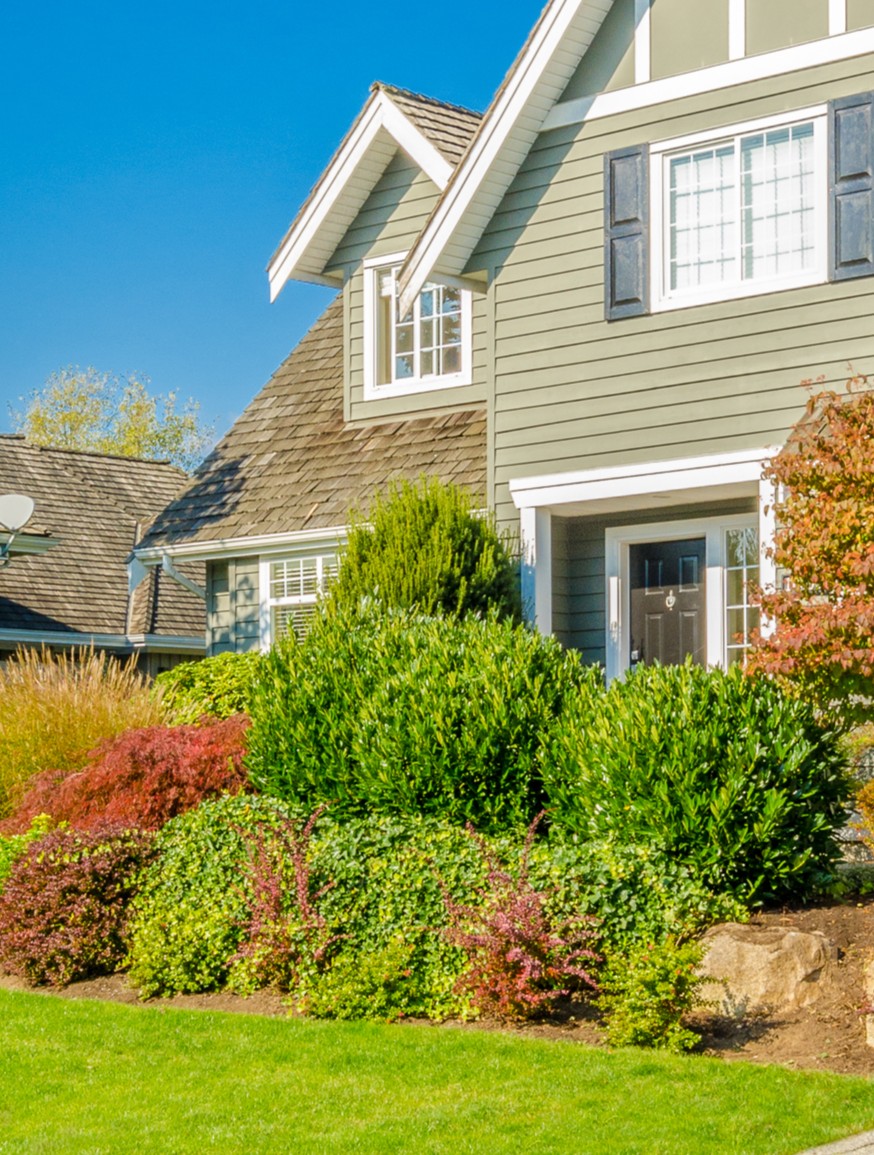 Luxury house at sunny day in Vancouver, Canada. vertical2