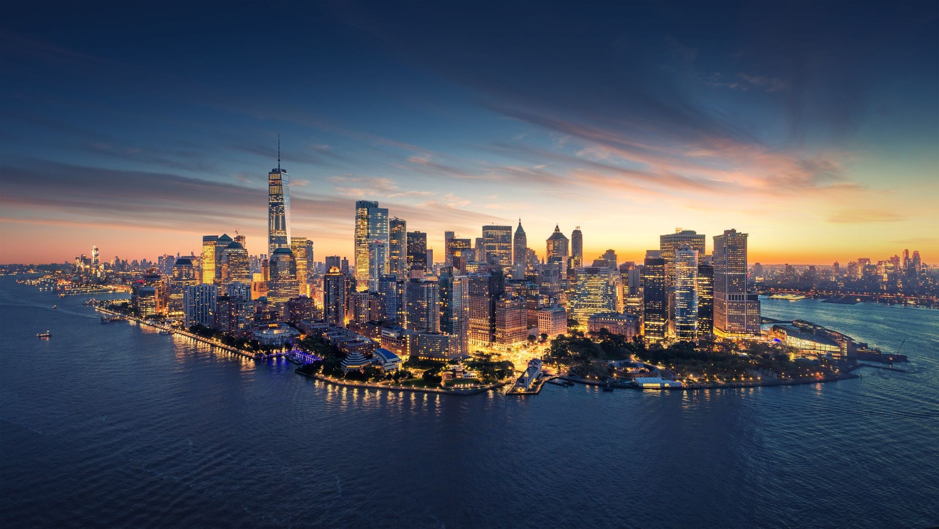 New York City panorama skyline at sunrise. Manhattan office buildings skysrcapers at the morning. New York City panoramatic shot.