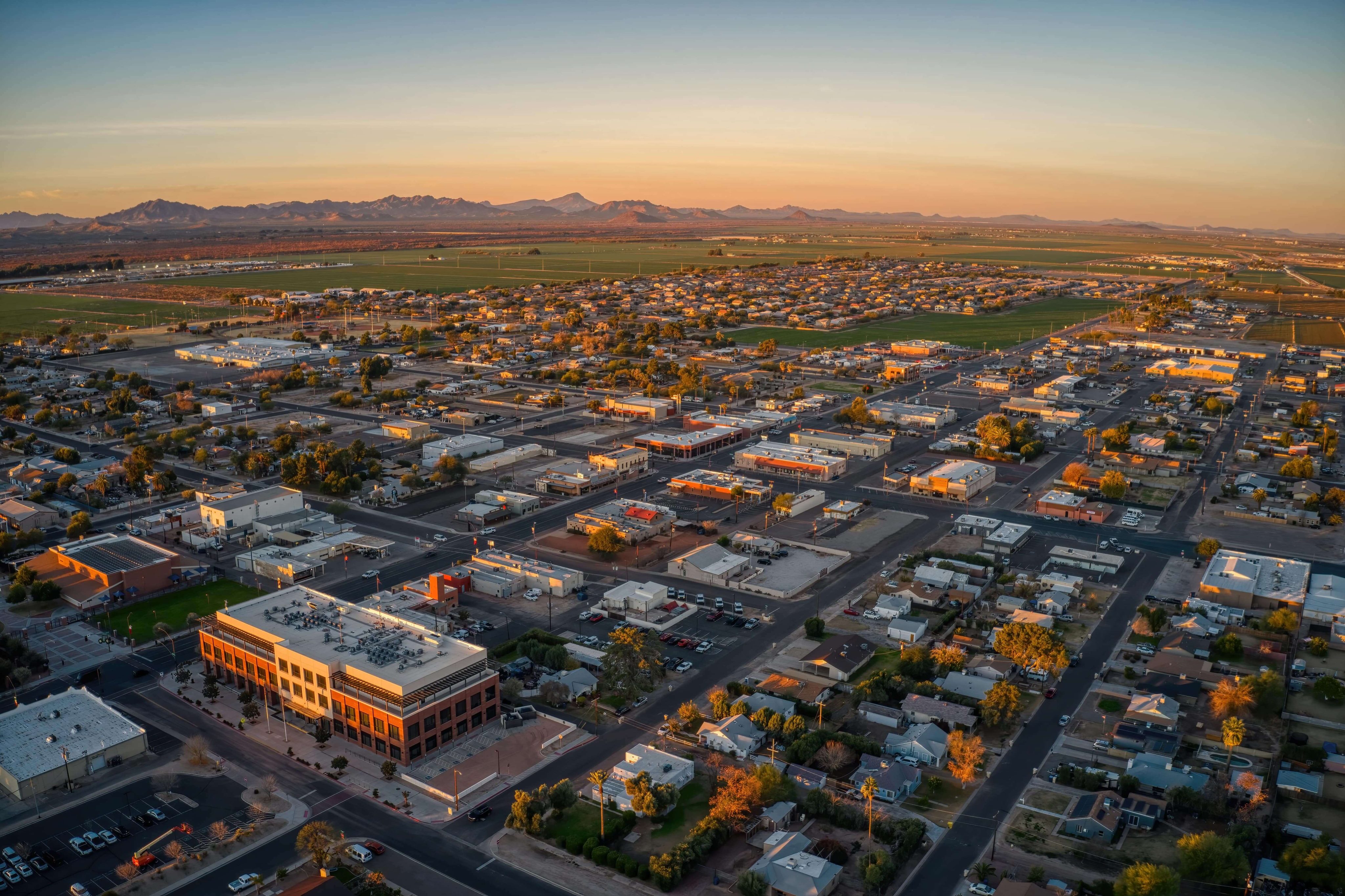 Aerial View of Sunrise over the Phoenix Suburb of Buckeye, Arizona-min