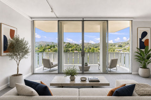 Living room of Los Feliz condominium with city views