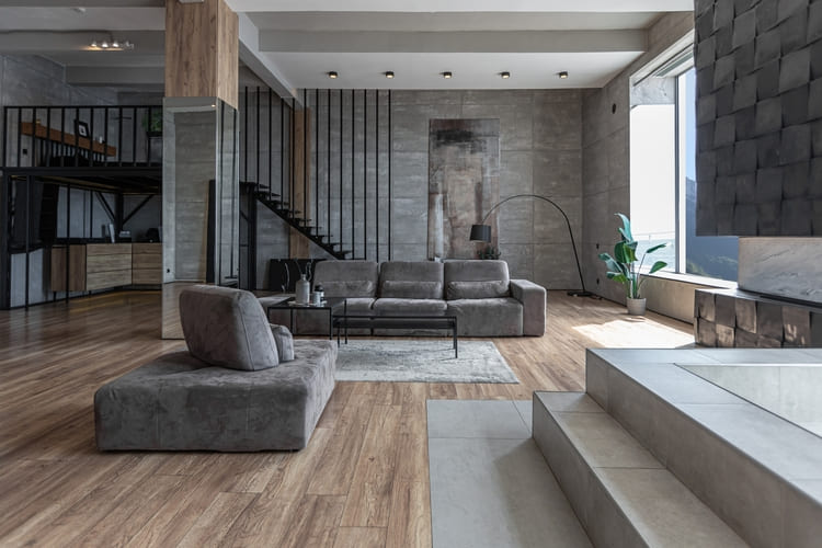 stylish minimalistic restrained modern interior of the apartment, a spacious room with a swimming pool, large panoramic windows overlooking the mountains. without people in the daytime