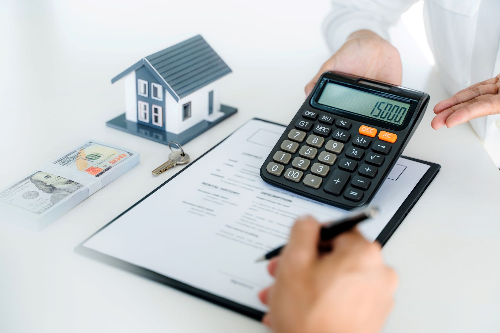 Concept of Property, Real estate agent with customer rent or buy house with contract.