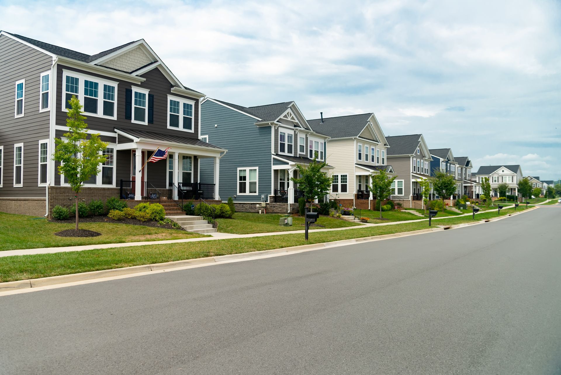 Row of Single Family Homes Along Road with Parking in Virginia