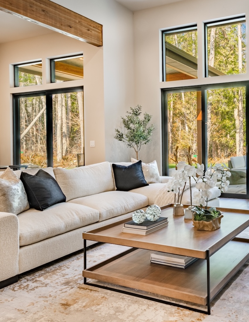 walk in closet and laundry room with staging and stainless appliances deep sink grey cabinets copy