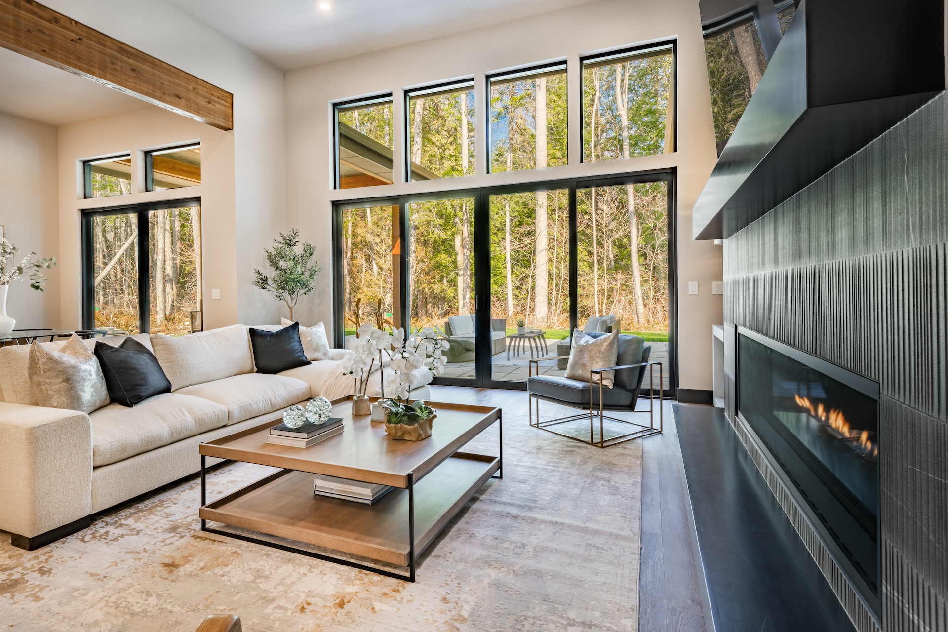 walk in closet and laundry room with staging and stainless appliances deep sink grey cabinets