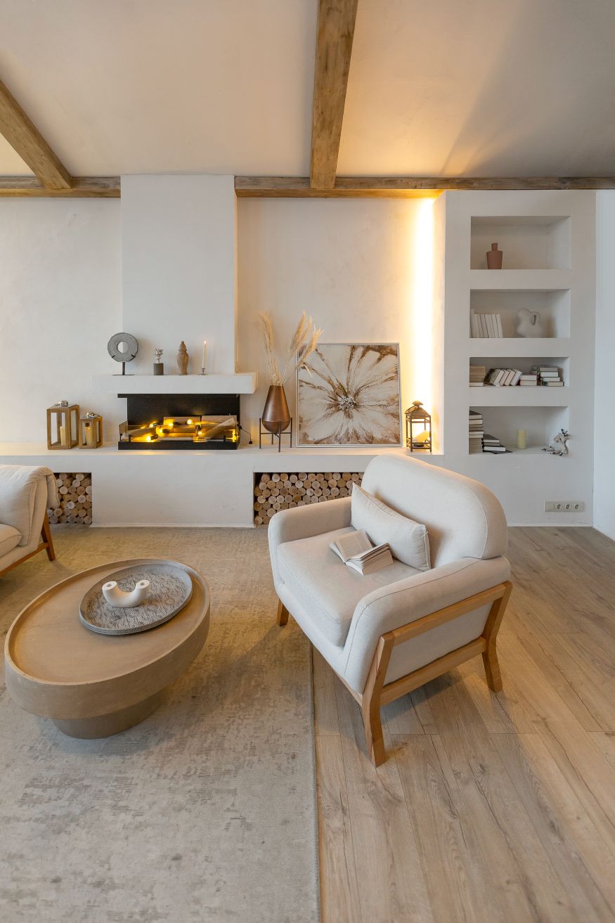 cozy warm home interior of a chic country house with an open plan, wood finishes, warm colors and a family hearth