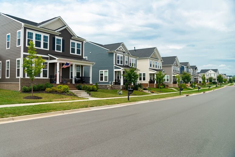 Row of Single Family Homes Along Road with Parking in Virginia