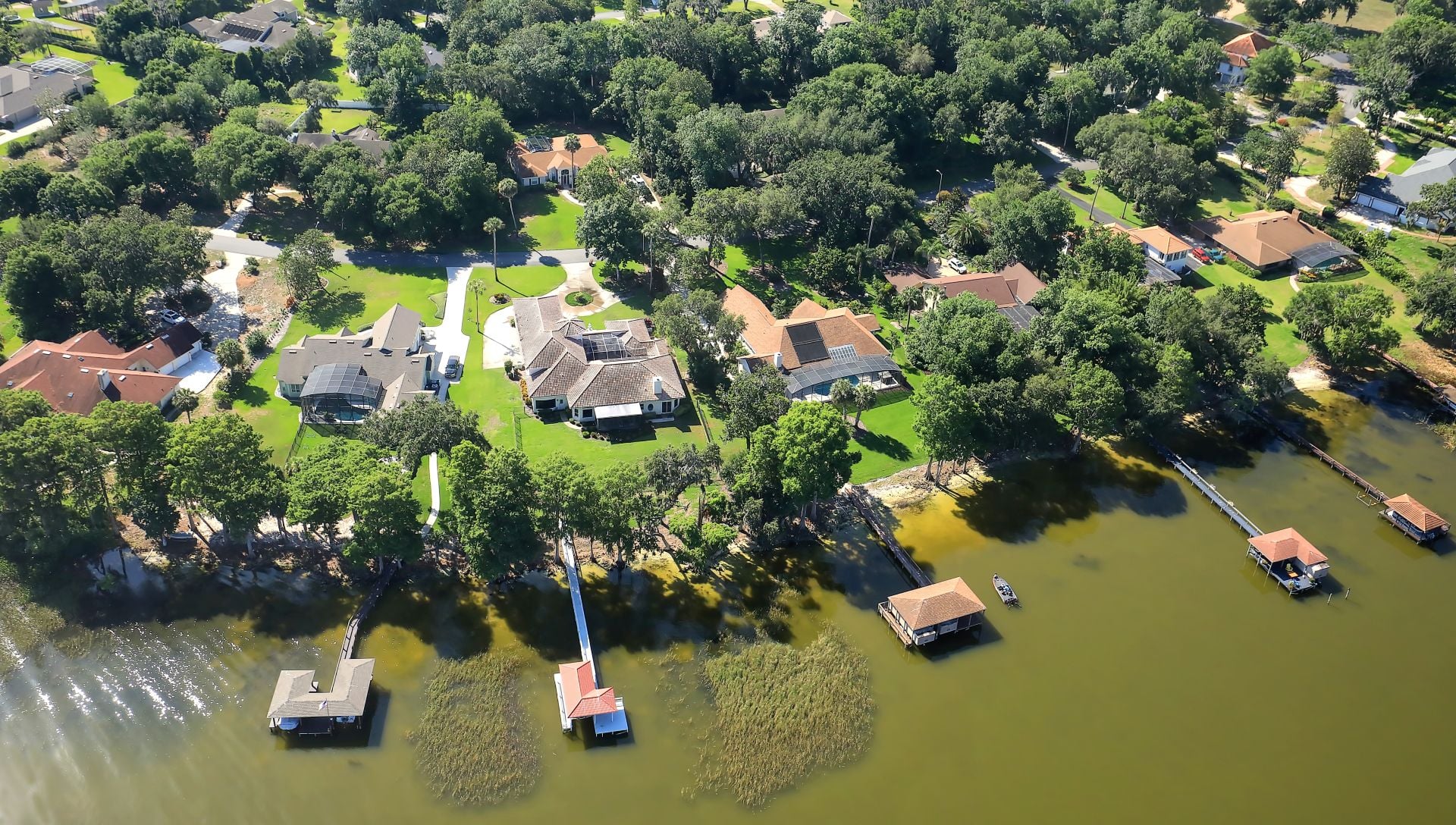 Aerial view of homes over Lake Dora in Tavares, Florida. Tavares is known as America's Seaplane City.