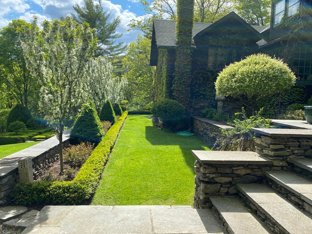 Side view with grass and patio