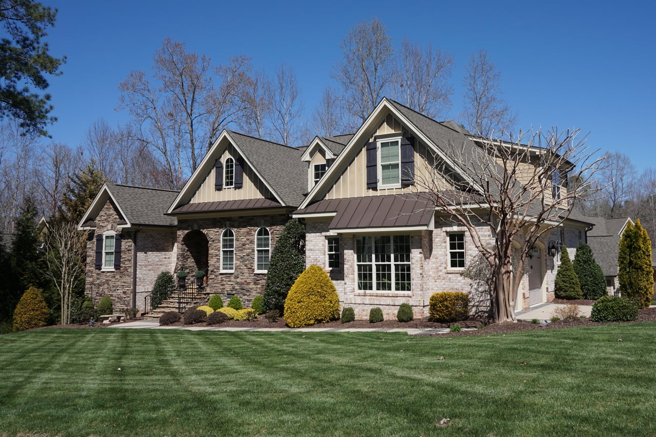 Suburban,Home,With,A,Stone,And,Brick,Exterior,And,Nice
