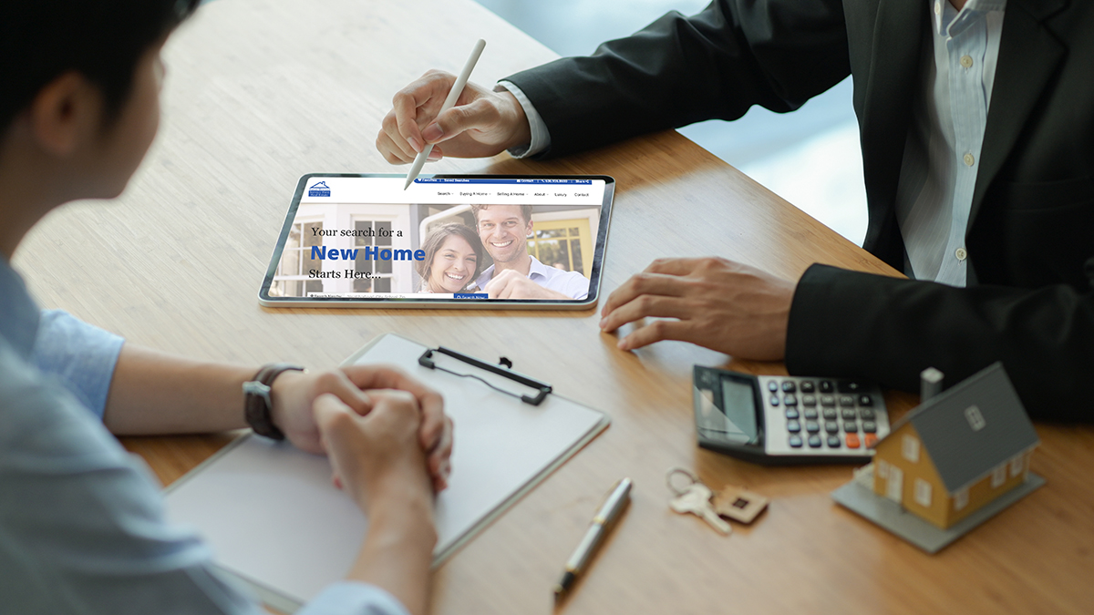 Insurance agents with tablet are introducing real estate insuran