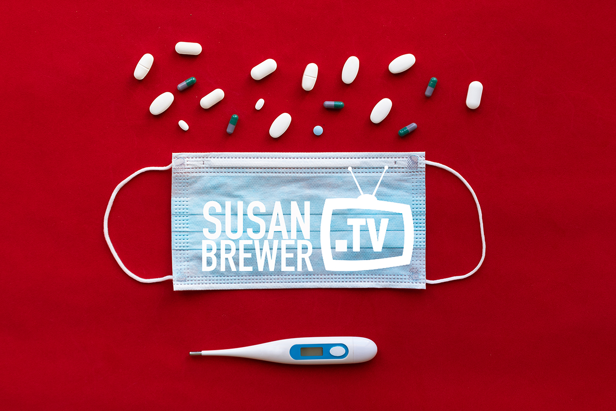 Protective face mask, thermometer and pills on red background. V