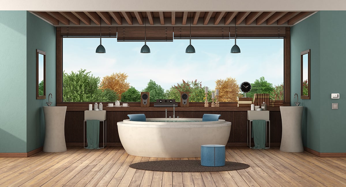 Green luxury bathroom with round bathtub