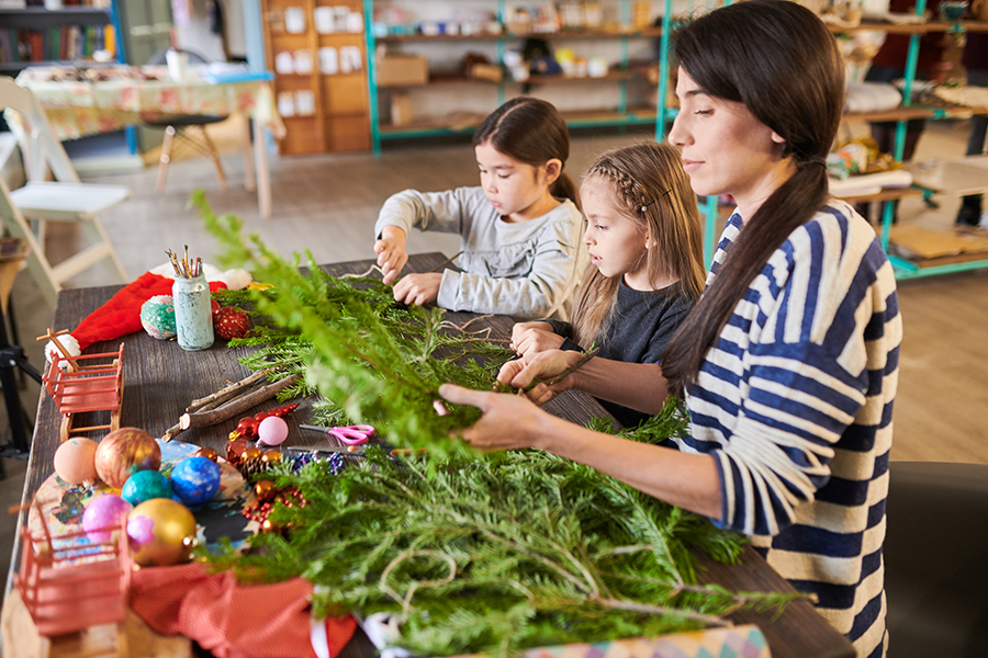 Family Making Christmas Wreaths