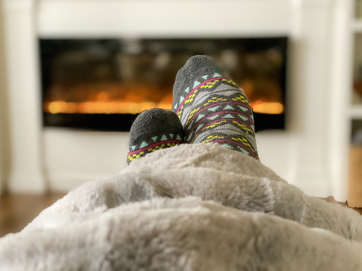 relax-and-cozy-by-fireplace-comfortable-snug-as-a-bug-warm-resting-homely-cheerful-pleasant-safe_t20_XxZRRG