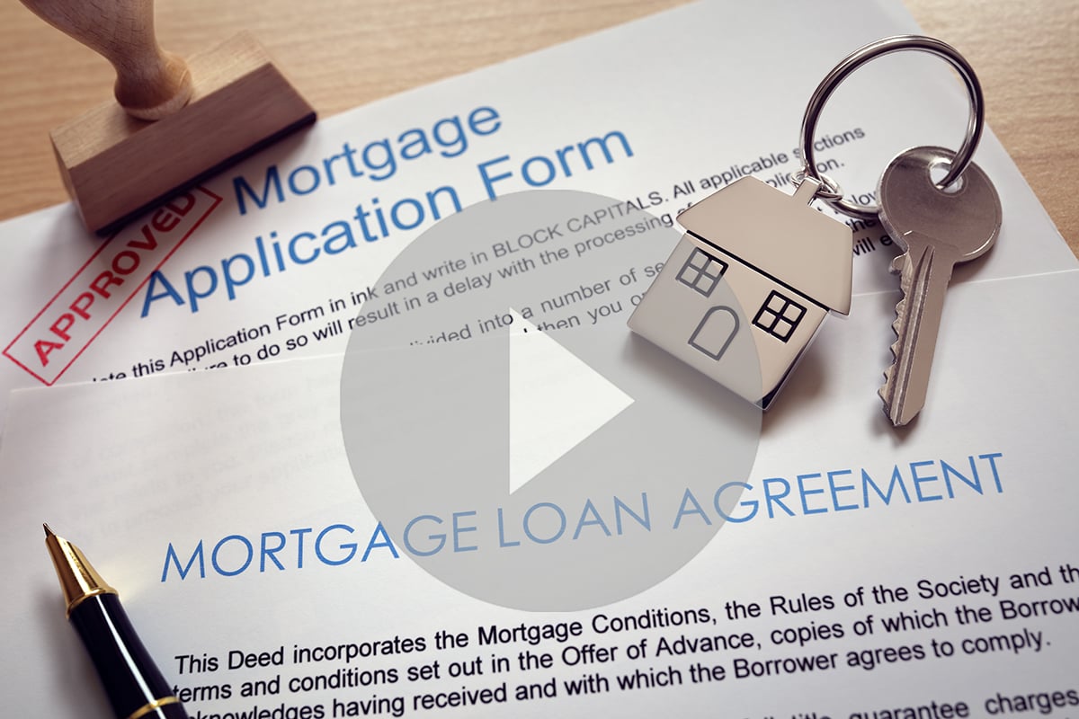 Mortgage application loan agreement and house key