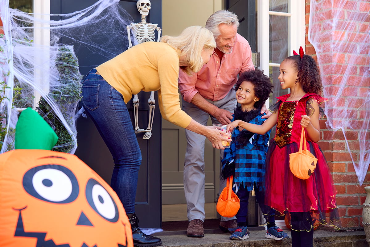 Grandchildren Dressing Up And Visiting Grandparent's House Trick