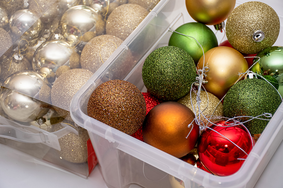 Christmas balls in a plastic transparent boxes ready to decorate a Christmas tree