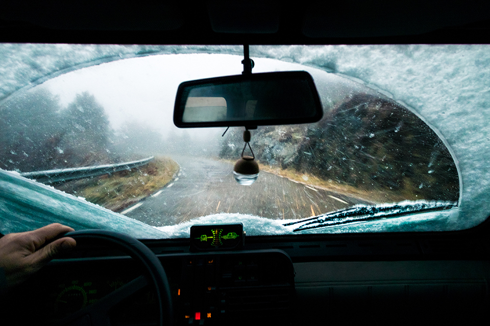 Person driving in snowy day