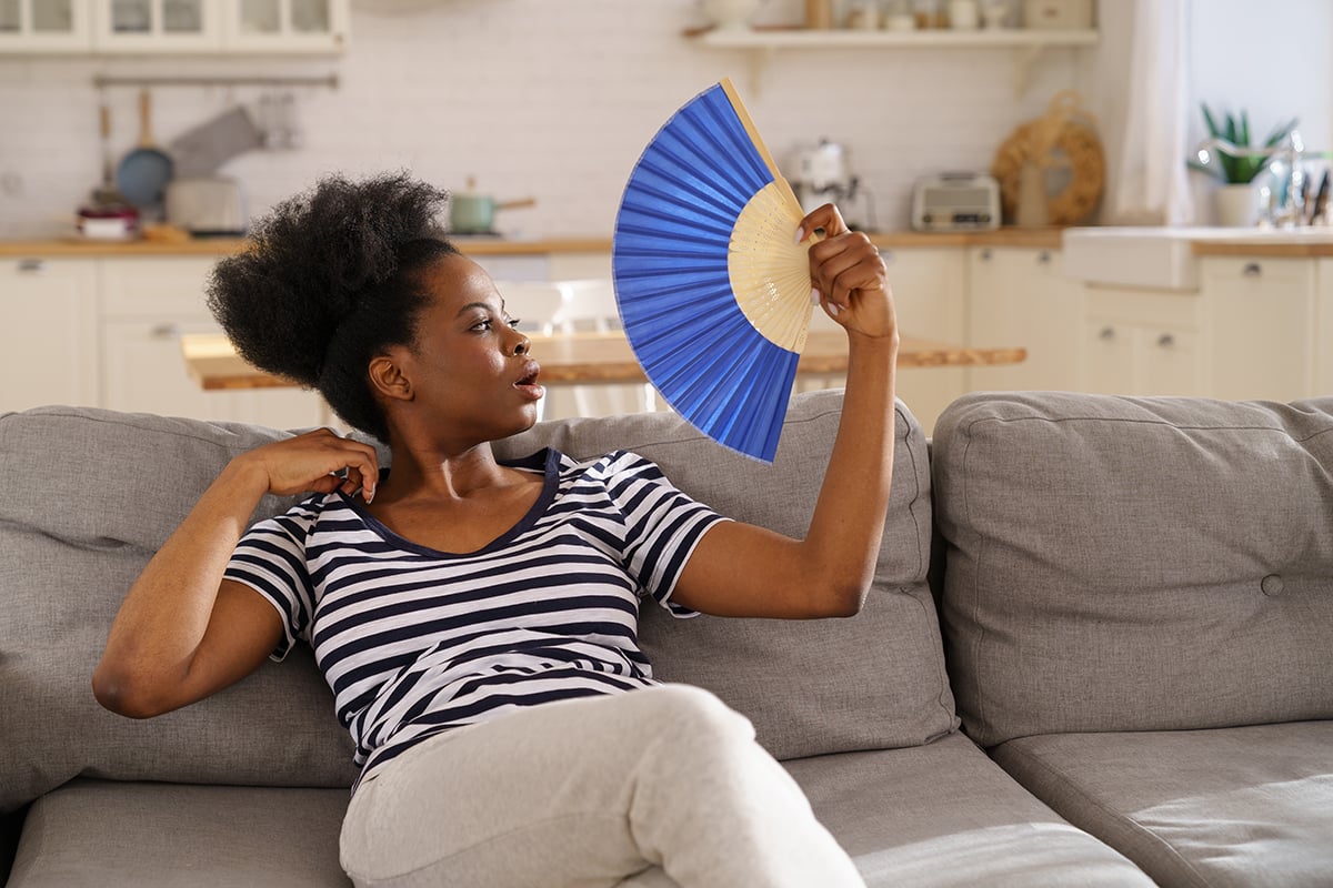 black-woman-suffering-from-heatstroke-flat-without-2023-11-27-04-51-53-utc
