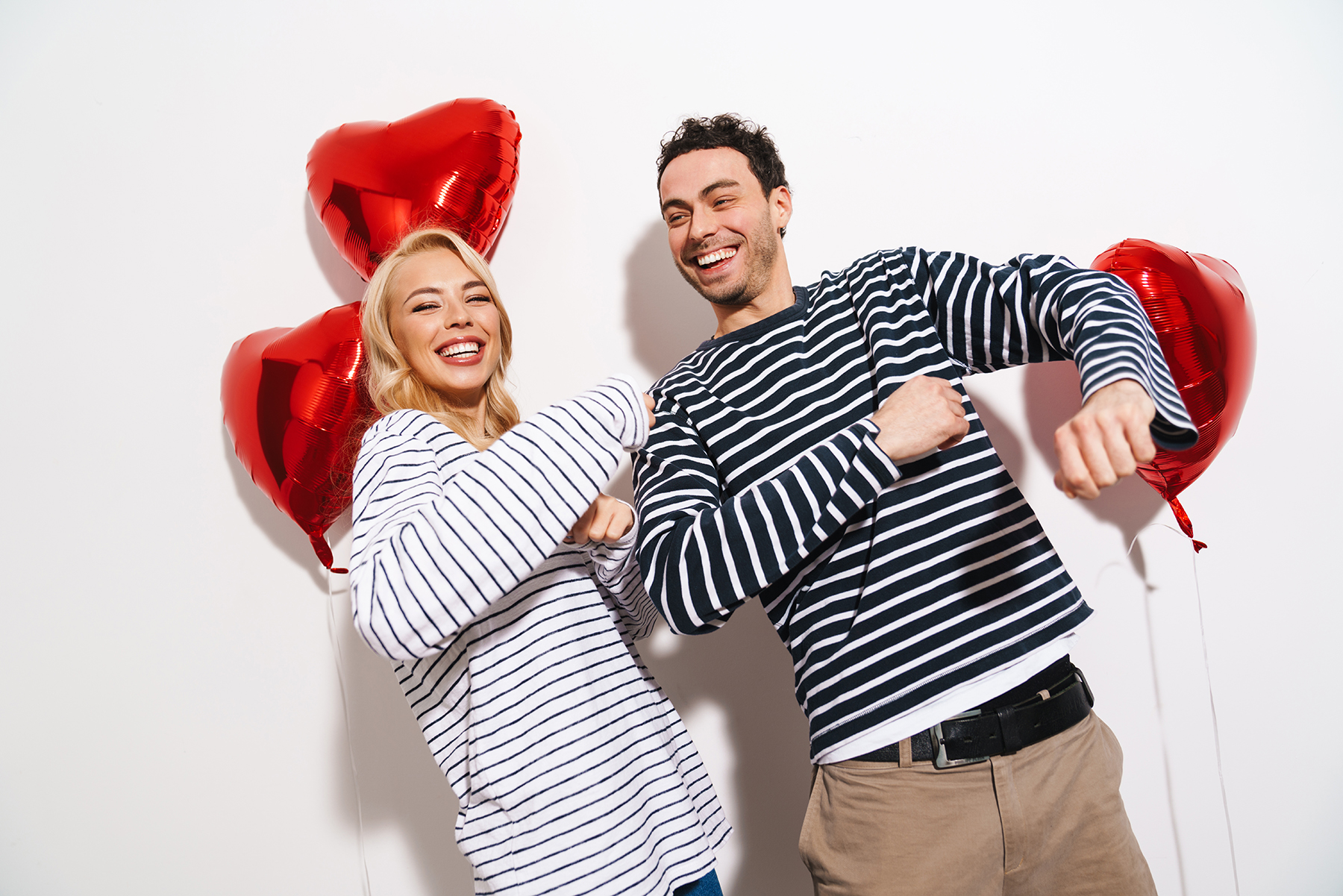 Happy attractive young couple celebrating Valentines Day