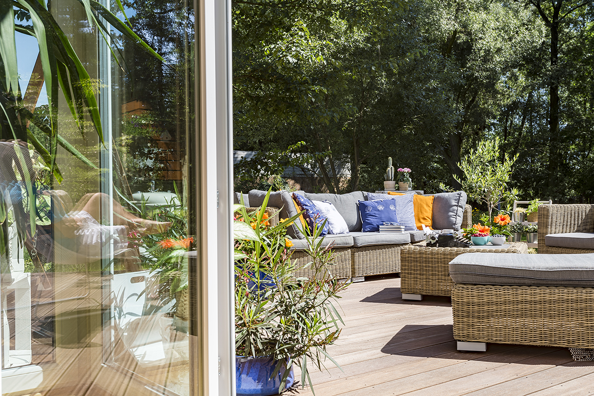 Spacious creative terrace with sofas