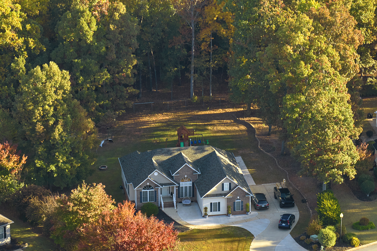 Aerial view of classical american home in South Carolina residential area. New family house as example of real estate development in USA suburbs